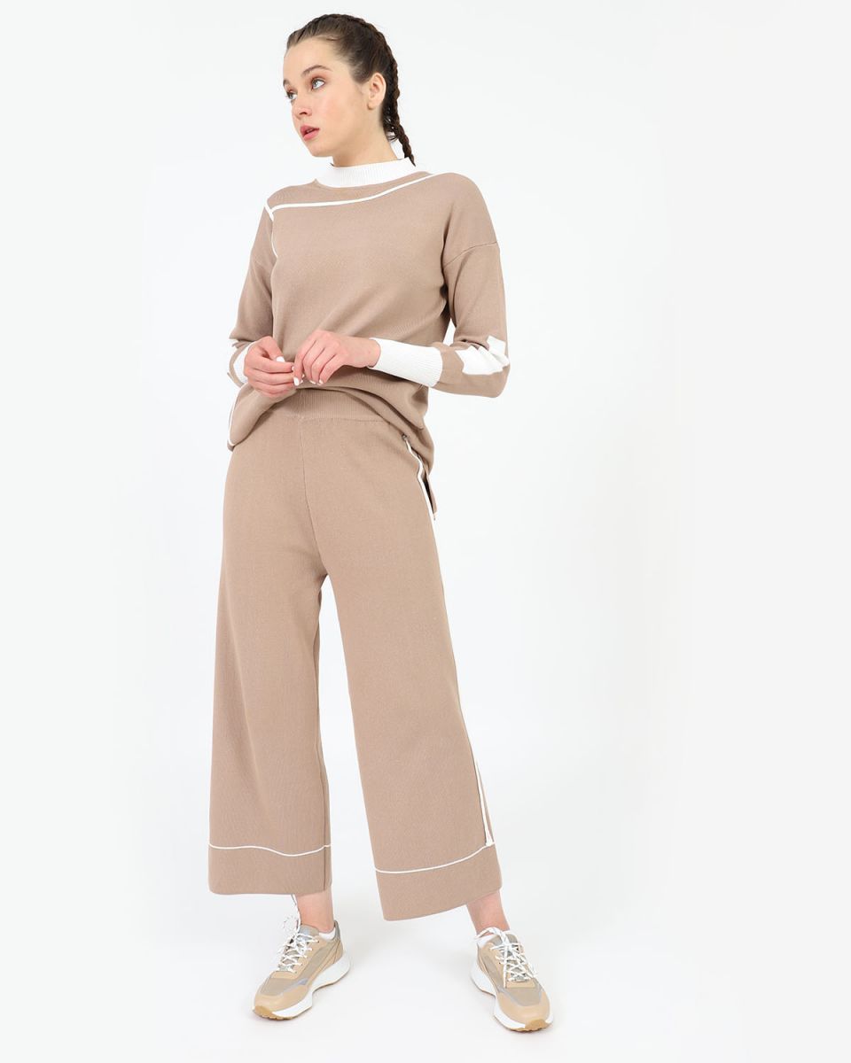 panteloni-mpez-me-leukes-leptomereies-doca